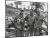Robert Capa (Left) and Ernest Hemingway (Right) with their Driver U.S. Army Driver-null-Mounted Photo