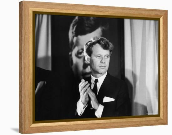 Robert F. Kennedy Campaigning in Front of Poster Portrait of His Brother President John F. Kennedy-Bill Eppridge-Framed Premier Image Canvas
