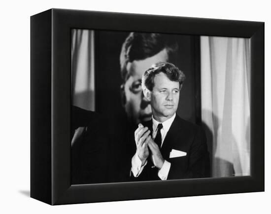 Robert F. Kennedy Campaigning in Front of Poster Portrait of His Brother President John F. Kennedy-Bill Eppridge-Framed Premier Image Canvas