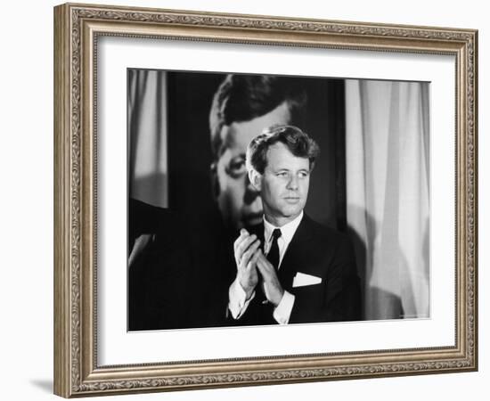 Robert F. Kennedy Campaigning in Front of Poster Portrait of His Brother President John F. Kennedy-Bill Eppridge-Framed Photographic Print