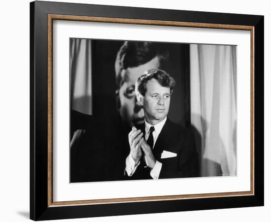 Robert F. Kennedy Campaigning in Front of Poster Portrait of His Brother President John F. Kennedy-Bill Eppridge-Framed Photographic Print