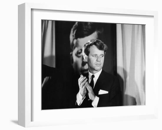 Robert F. Kennedy Campaigning in Front of Poster Portrait of His Brother President John F. Kennedy-Bill Eppridge-Framed Photographic Print