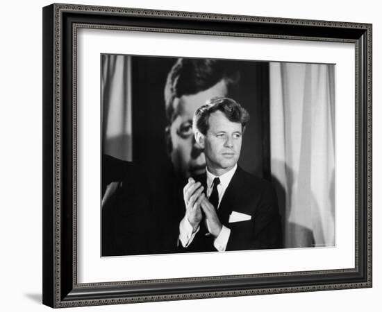 Robert F. Kennedy Campaigning in Front of Poster Portrait of His Brother President John F. Kennedy-Bill Eppridge-Framed Photographic Print