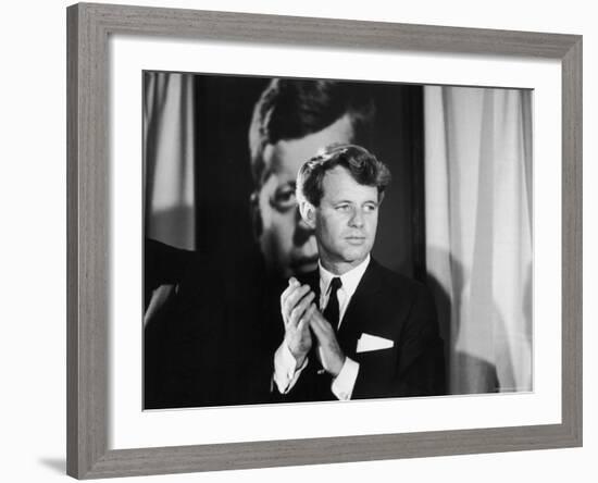 Robert F. Kennedy Campaigning in Front of Poster Portrait of His Brother President John F. Kennedy-Bill Eppridge-Framed Photographic Print