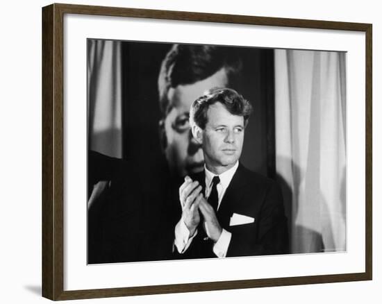 Robert F. Kennedy Campaigning in Front of Poster Portrait of His Brother President John F. Kennedy-Bill Eppridge-Framed Photographic Print