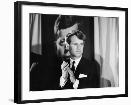 Robert F. Kennedy Campaigning in Front of Poster Portrait of His Brother President John F. Kennedy-Bill Eppridge-Framed Photographic Print