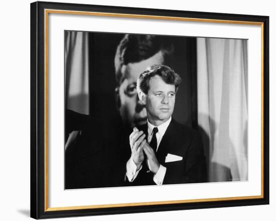 Robert F. Kennedy Campaigning in Front of Poster Portrait of His Brother President John F. Kennedy-Bill Eppridge-Framed Photographic Print