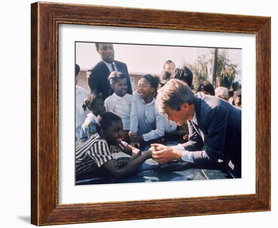 Robert F. Kennedy Meeting with Some African American Kids During Political Campaign-Bill Eppridge-Framed Photographic Print