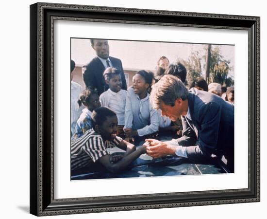 Robert F. Kennedy Meeting with Some African American Kids During Political Campaign-Bill Eppridge-Framed Photographic Print