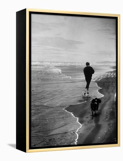 Robert F. Kennedy Running on the Beach with His Dog Freckles-Bill Eppridge-Framed Premier Image Canvas