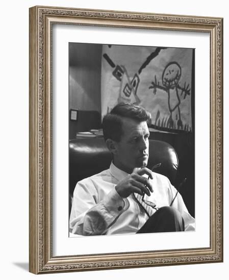 Robert F. Kennedy Sitting in Office in Front of Child's Painting-null-Framed Photographic Print