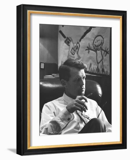 Robert F. Kennedy Sitting in Office in Front of Child's Painting-null-Framed Photographic Print