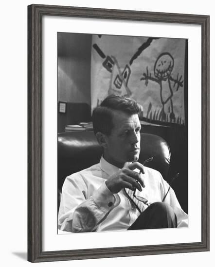 Robert F. Kennedy Sitting in Office in Front of Child's Painting-null-Framed Photographic Print