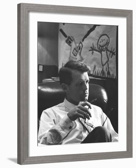 Robert F. Kennedy Sitting in Office in Front of Child's Painting-null-Framed Photographic Print