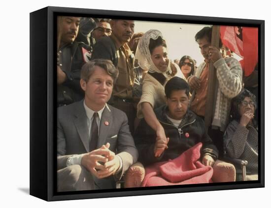 Robert F. Kennedy Sitting Next to Cesar Chavez During Rally for the United Farm Workers Union-Michael Rougier-Framed Premier Image Canvas