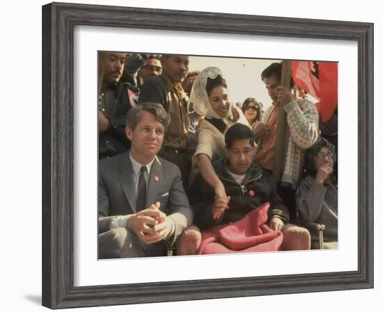 Robert F. Kennedy Sitting Next to Cesar Chavez During Rally for the United Farm Workers Union-Michael Rougier-Framed Premium Photographic Print