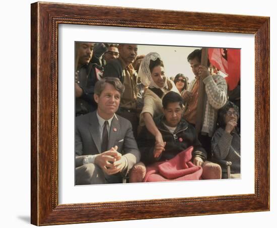 Robert F. Kennedy Sitting Next to Cesar Chavez During Rally for the United Farm Workers Union-Michael Rougier-Framed Premium Photographic Print