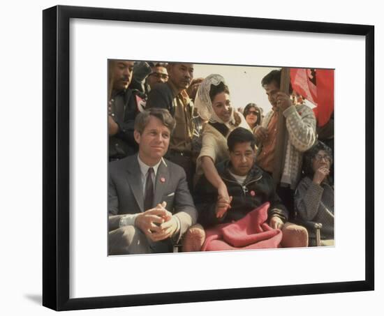 Robert F. Kennedy Sitting Next to Cesar Chavez During Rally for the United Farm Workers Union-Michael Rougier-Framed Premium Photographic Print