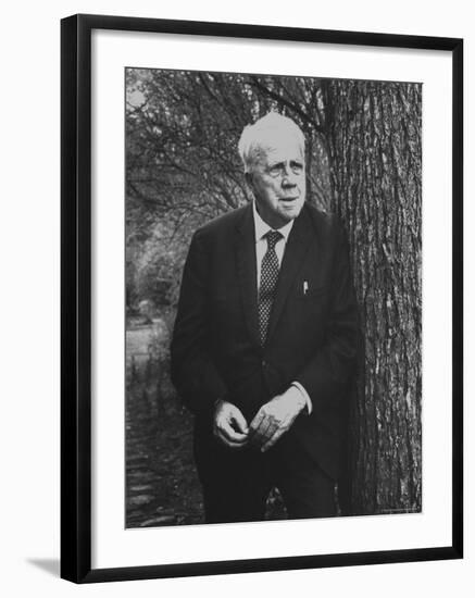 Robert Frost Leaning Against Tree on Campus of Amherst College Where He is a Professor of English-Gordon Parks-Framed Premium Photographic Print