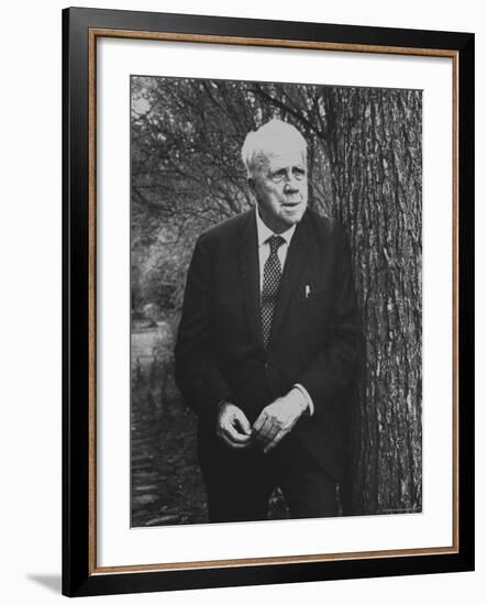 Robert Frost Leaning Against Tree on Campus of Amherst College Where He is a Professor of English-Gordon Parks-Framed Premium Photographic Print