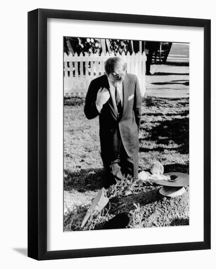 Robert Kennedy Prays at His Brother's Grave-null-Framed Photo