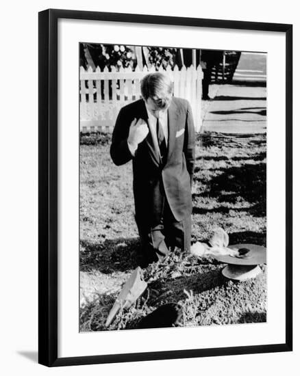 Robert Kennedy Prays at His Brother's Grave-null-Framed Photo