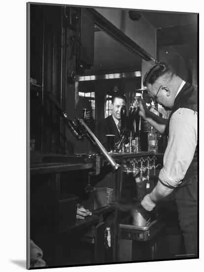 Robert Neve Buying Round of Beer at Bar-Hans Wild-Mounted Photographic Print