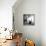 Robert Rauschenberg Sitting on His Sculpture in Studio, Among Other Paintings and Sculptures-Allan Grant-Framed Premier Image Canvas displayed on a wall