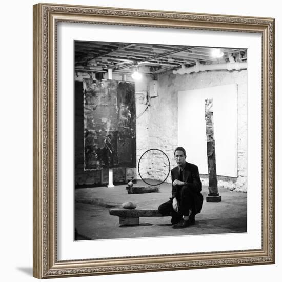 Robert Rauschenberg Sitting on His Sculpture in Studio, Among Other Paintings and Sculptures-Allan Grant-Framed Premium Photographic Print