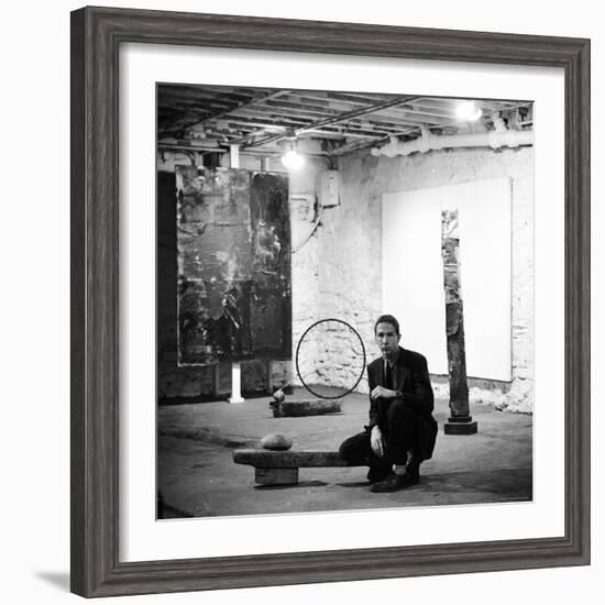 Robert Rauschenberg Sitting on His Sculpture in Studio, Among Other Paintings and Sculptures-Allan Grant-Framed Premium Photographic Print