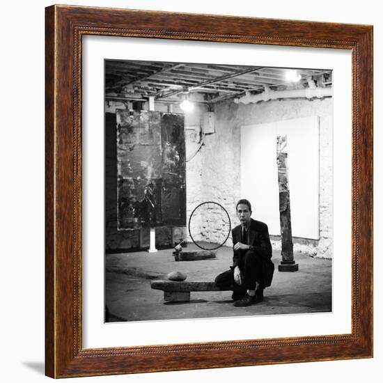 Robert Rauschenberg Sitting on His Sculpture in Studio, Among Other Paintings and Sculptures-Allan Grant-Framed Premium Photographic Print