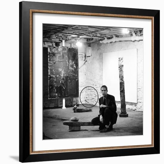 Robert Rauschenberg Sitting on His Sculpture in Studio, Among Other Paintings and Sculptures-Allan Grant-Framed Premium Photographic Print