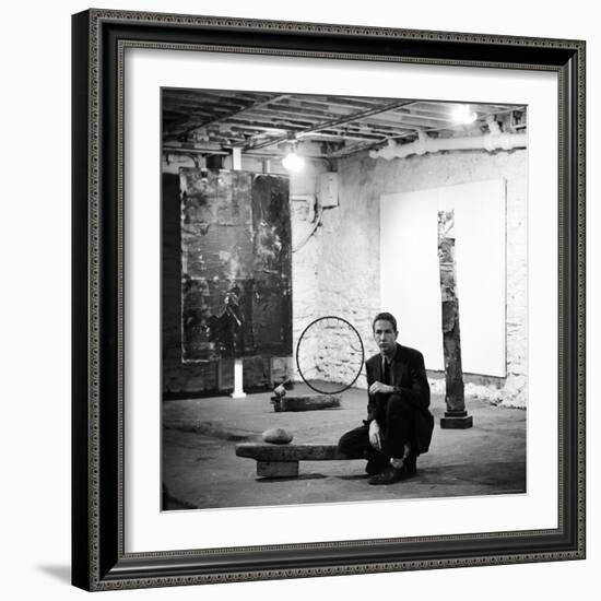 Robert Rauschenberg Sitting on His Sculpture in Studio, Among Other Paintings and Sculptures-Allan Grant-Framed Premium Photographic Print