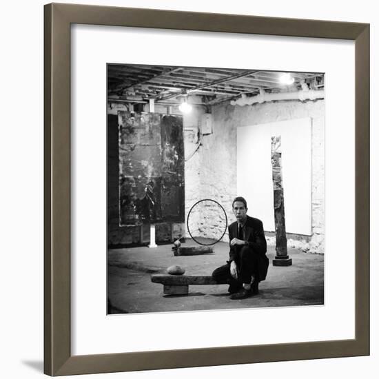 Robert Rauschenberg Sitting on His Sculpture in Studio, Among Other Paintings and Sculptures-Allan Grant-Framed Premium Photographic Print