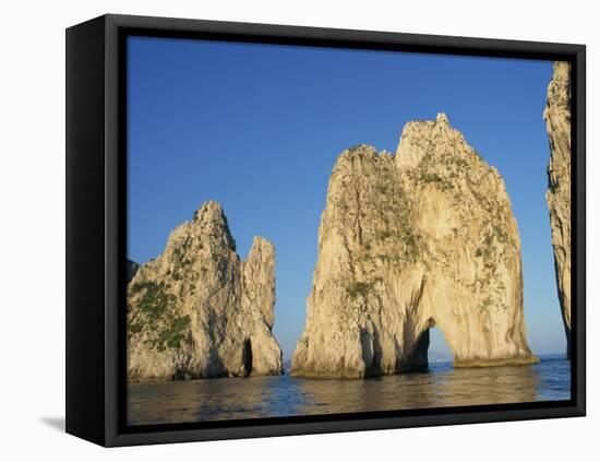 Rock Arches known as the Faraglioni Stacks Off the Coast of the Island of Capri, Campania, Italy-Ken Gillham-Framed Premier Image Canvas