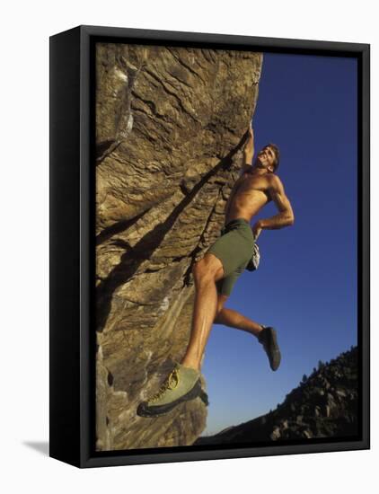 Rock Climber Hanging from Grip-null-Framed Premier Image Canvas