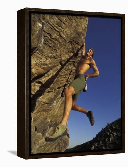 Rock Climber Hanging from Grip-null-Framed Premier Image Canvas