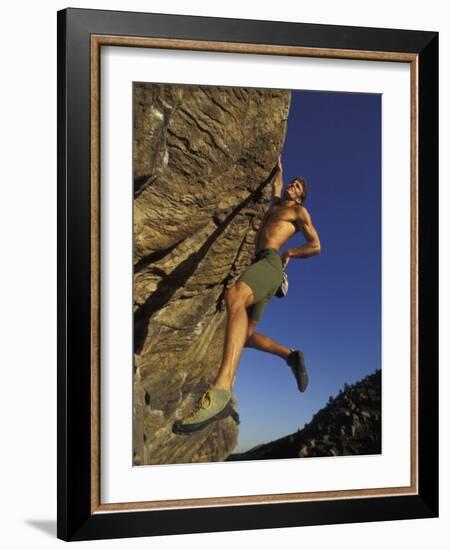 Rock Climber Hanging from Grip-null-Framed Photographic Print