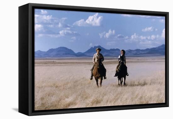 Rock Hudson and Elizabeth Taylor Ride Horses During the Filming of 'Giant', Marfa, Texas, 1956-Allan Grant-Framed Premier Image Canvas