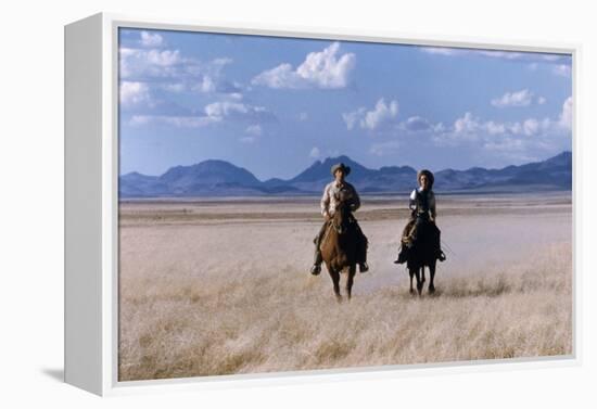 Rock Hudson and Elizabeth Taylor Ride Horses During the Filming of 'Giant', Marfa, Texas, 1956-Allan Grant-Framed Premier Image Canvas