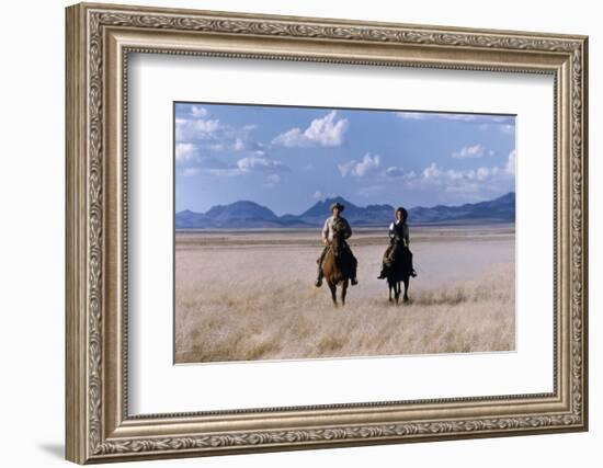 Rock Hudson and Elizabeth Taylor Ride Horses During the Filming of 'Giant', Marfa, Texas, 1956-Allan Grant-Framed Photographic Print