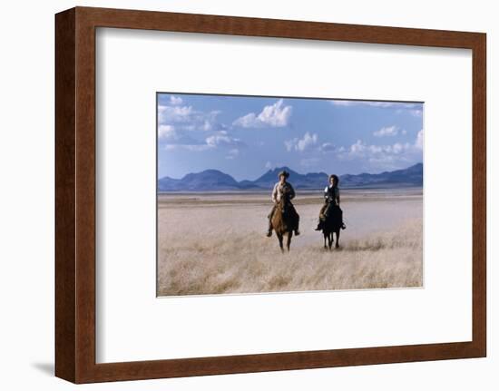 Rock Hudson and Elizabeth Taylor Ride Horses During the Filming of 'Giant', Marfa, Texas, 1956-Allan Grant-Framed Photographic Print