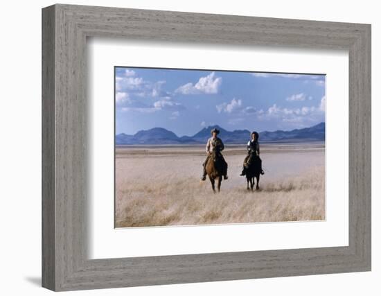 Rock Hudson and Elizabeth Taylor Ride Horses During the Filming of 'Giant', Marfa, Texas, 1956-Allan Grant-Framed Photographic Print