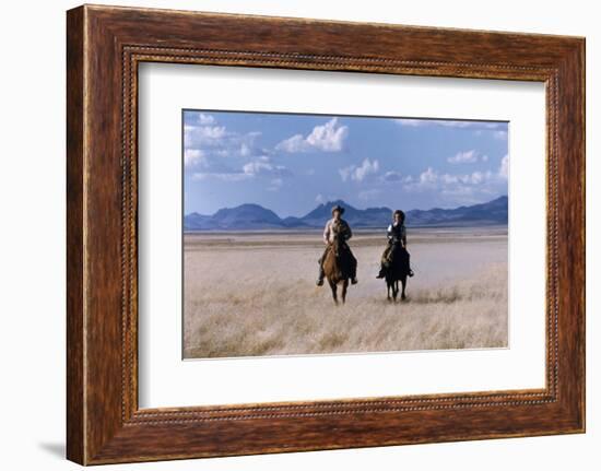 Rock Hudson and Elizabeth Taylor Ride Horses During the Filming of 'Giant', Marfa, Texas, 1956-Allan Grant-Framed Photographic Print