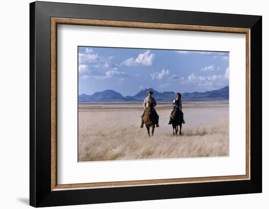 Rock Hudson and Elizabeth Taylor Ride Horses During the Filming of 'Giant', Marfa, Texas, 1956-Allan Grant-Framed Photographic Print