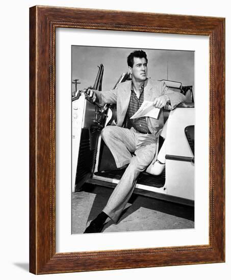 Rock Hudson in a Convertible, 1959-null-Framed Photo