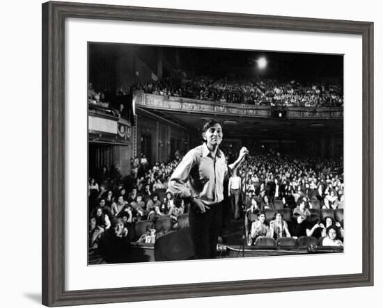 Rock Promoter Bill Graham Onstage with Audience Visible, at Fillmore East-John Olson-Framed Premium Photographic Print