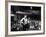 Rock Promoter Bill Graham Onstage with Audience Visible, at Fillmore East-John Olson-Framed Premium Photographic Print