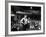 Rock Promoter Bill Graham Onstage with Audience Visible, at Fillmore East-John Olson-Framed Premium Photographic Print