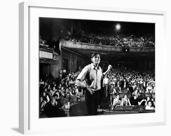 Rock Promoter Bill Graham Onstage with Audience Visible, at Fillmore East-John Olson-Framed Premium Photographic Print